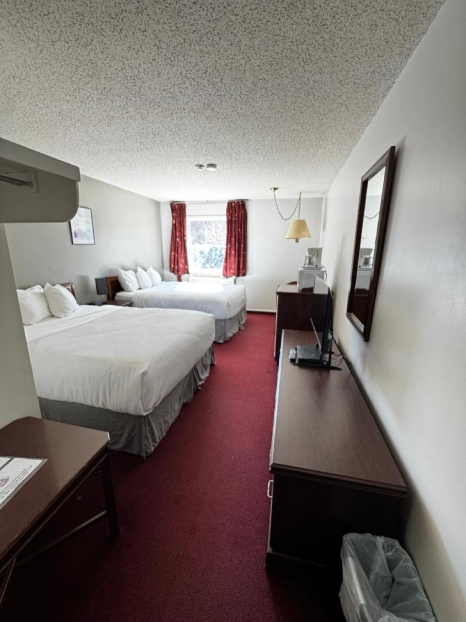 Zero-100 Motel Heron Bay Exterior photo